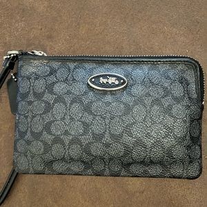 Coach signature wristlet.